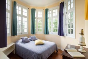 Postel nebo postele na pokoji v ubytování Villa Des Dunes