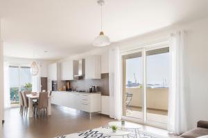 A kitchen or kitchenette at Casa Tiziana - ApulianStay Group