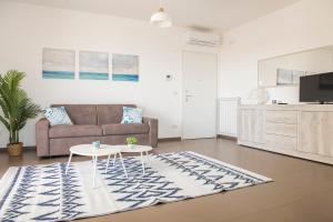 A television and/or entertainment centre at Casa Tiziana - ApulianStay Group