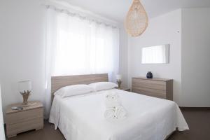 A bed or beds in a room at Casa Tiziana - ApulianStay Group