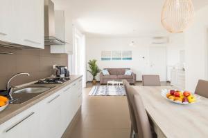 A kitchen or kitchenette at Casa Tiziana - ApulianStay Group