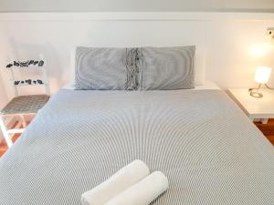 Posteľ alebo postele v izbe v ubytovaní Pension Aussie Guesthouse