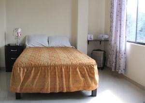 Cama o camas de una habitación en Hostal du Parc