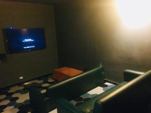 TV o dispositivi per l'intrattenimento presso Casa Kiwi Hostel