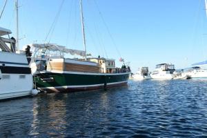 a group of boats are docked in the water at Wharfside Bed & Breakfast in Friday Harbor