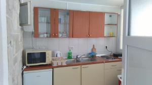 Küche/Küchenzeile in der Unterkunft Apartments Lončarević