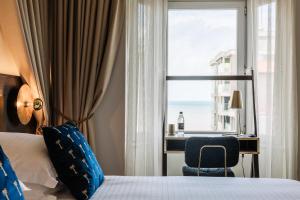 Postel nebo postele na pokoji v ubytování C-Hotels Continental
