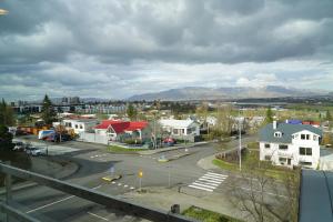 a view of a town with houses and a street at Om Apartments in Reykjavík