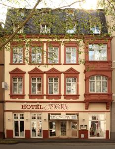 
a building with a large window on the side of it at Astoria Hotel in Trier
