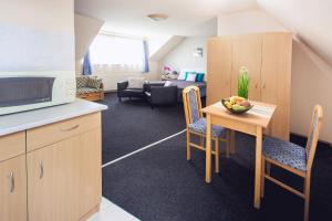 Kuchyňa alebo kuchynka v ubytovaní Apartman Szanyi