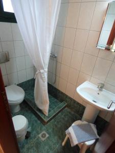 Phòng tắm tại Dolphins Apartments & Rooms +38 ảnh