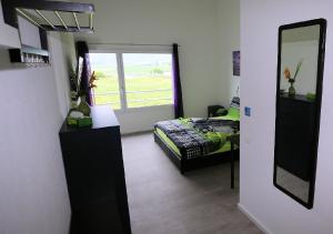 Uma cama ou camas num quarto em BeachIN - Sport, Events, Hotel, Restaurant, Bar