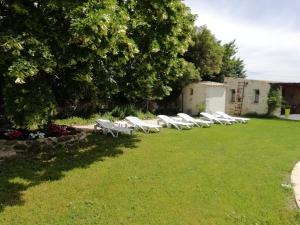 Zahrada ubytování A la Maison d'Hôtes + 6 fotografií
