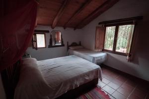 Posteľ alebo postele v izbe v ubytovaní La Toscana