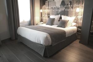 Кровать или кровати в номере Le Petit Boutique Hotel