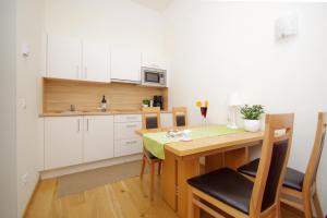 A kitchen or kitchenette at Residence Diana
