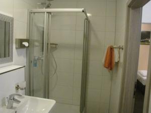 Koupelna v ubytování Milano Hotel