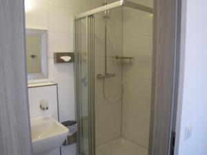 Koupelna v ubytování Milano Hotel