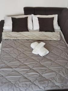 Postel nebo postele na pokoji v ubytování Apartman MMS