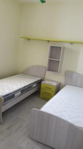 A bed or beds in a room at CASA & RELAX