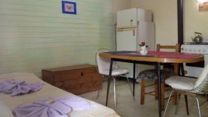 Una cocina o kitchenette en Hosteria Aura Azul (ex Ser Azul)