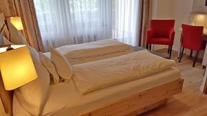 Postel nebo postele na pokoji v ubytování Landgasthaus Zollerstuben