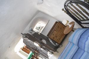 a room with a table and a bed on a boat at Renato Canalone in Ponza