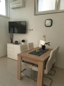 Televiisor ja/või meelelahutuskeskus majutusasutuses ML Apartman