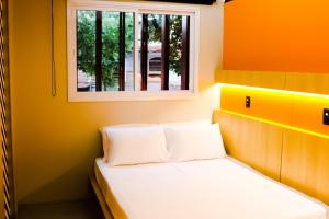 Cama ou camas em um quarto em Artsy Vitoria Hostel