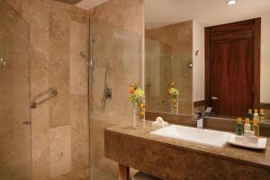 a bathroom with a sink and a shower at Krystal Grand Los Cabos - All Inclusive in San José del Cabo