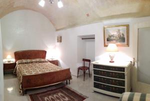 Postel nebo postele na pokoji v ubytování Palazzo del SalTo