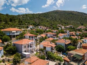 an aerial view of a town with houses at Aegean sea view luxury residence Thassos in Prinos
