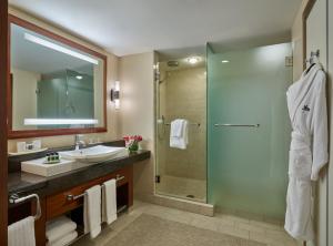 a bathroom with a sink and a shower at Battery Wharf Hotel, Boston Waterfront in Boston