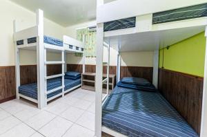 two bunk beds in a dorm room with at Hai Yin 船票 機車 活動 in Green Island