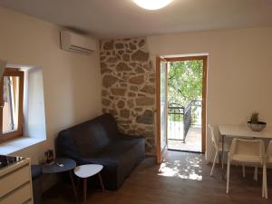 Posedenie v ubytovaní Apartments Jungic, Rab