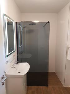 Kúpeľňa v ubytovaní Apartments Jungic, Rab