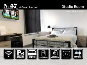 a poster of a bedroom with a bed and a tv at No57 in Crewe