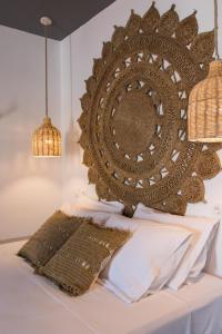A bed or beds in a room at Gorgona Blue Studiο