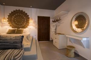 A bed or beds in a room at Gorgona Blue Studiο