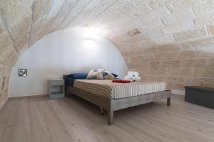 Posteľ alebo postele v izbe v ubytovaní AnSe' casa vacanze