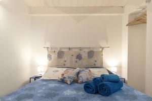 Posteľ alebo postele v izbe v ubytovaní AnSe' casa vacanze