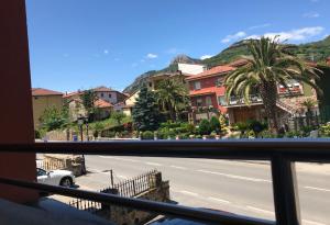 a view of a street from a balcony at La Paserina in Arenas de Cabrales