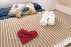 Posteľ alebo postele v izbe v ubytovaní AnSe' casa vacanze