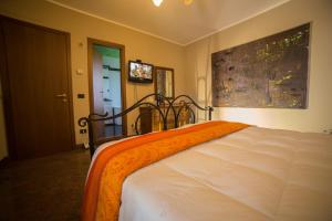 A bed or beds in a room at Villa Ivana