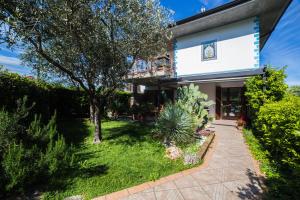 A garden outside Villa Ivana