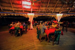 A restaurant or other place to eat at Lamanai Hotel & Marina