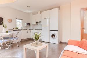 Η κουζίνα ή μικρή κουζίνα στο Apartamento Playa de Quenxe