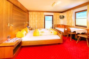 Łóżko lub łóżka w pokoju w obiekcie Appartement Jägerhof