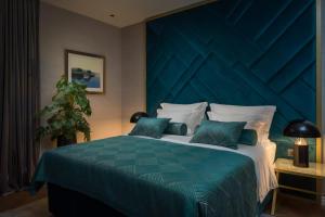 Postel nebo postele na pokoji v ubytování Five Elements Luxury Rooms