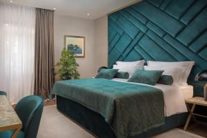 Postel nebo postele na pokoji v ubytování Five Elements Luxury Rooms